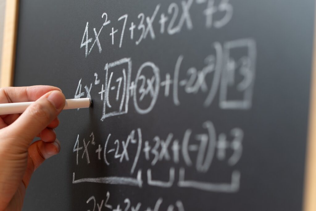 Algebra mathematic formula written on chalkboard